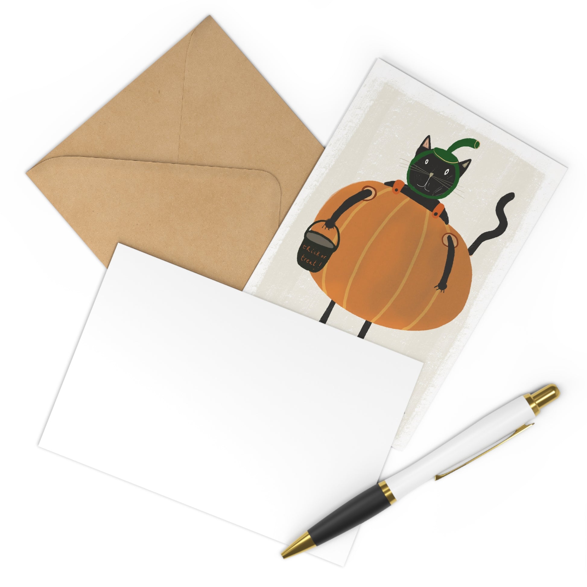 Greeting card with a black cat in a pumpkin, a pen, and an envelope on a white background