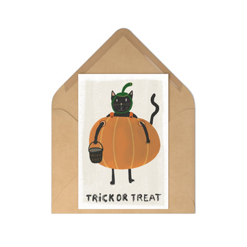 Halloween card with a black cat in a pumpkin, 'Trick or Treat' text, and brown envelope on a white background.
