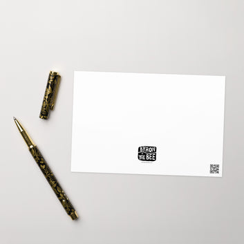 Singer songwriter playing guitar to wish happy birthday card with envelope